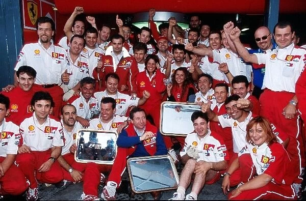 Formula One World Championship: The Ferrari team celebrate
