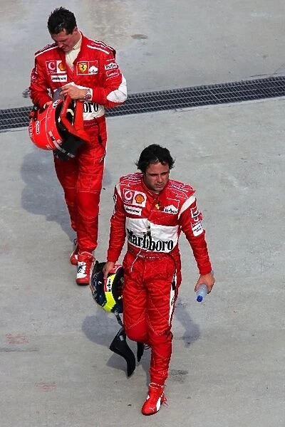 Formula One World Championship: Ferrari team mates Felipe Massa Ferrari and Michael Schumacher Ferrari in Parc Ferme
