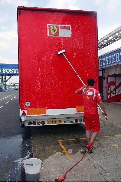 Formula One World Championship: A Ferrari truck is washed down