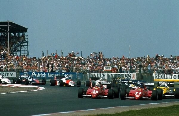 Formula One World Championship: The two Ferraris of Rene Arnoux, left, and Patrick Tambay lead the pack from a front row start