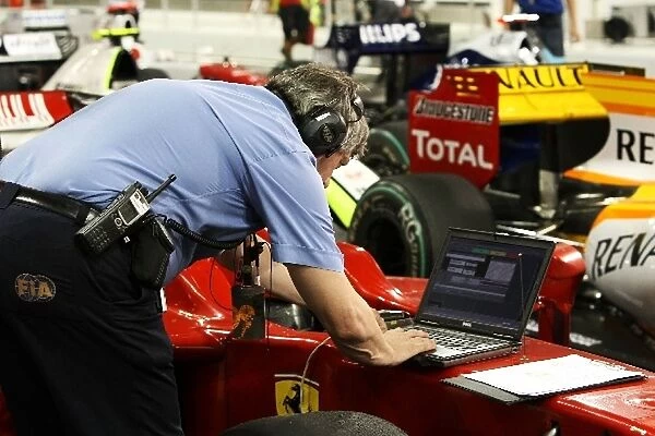 Formula One World Championship: FIA technician in parc ferme