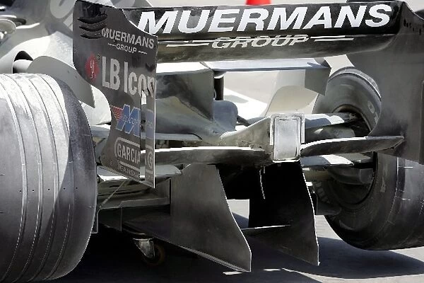 Formula One World Championship: Fire extinguisher foam on the car of Robert Doornbos Minardi after the rear brakes caught fire