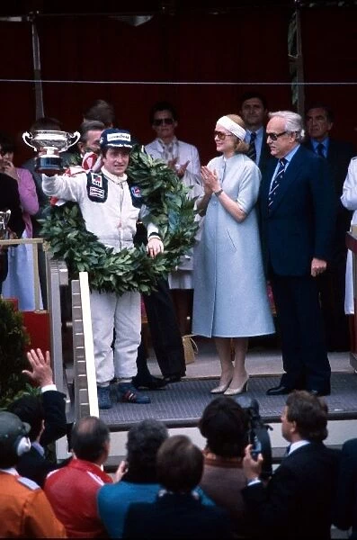 Formula One World Championship: First time race winner Patrick Depailler Tyrrell accepts his trophy from HSH Princess Grace of Monaco and HSH