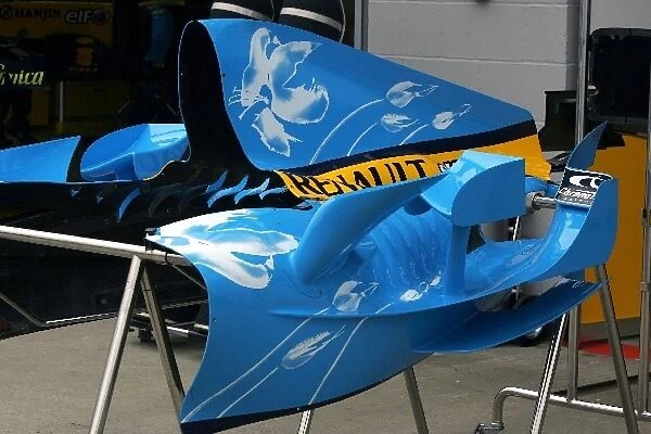 Formula One World Championship: Flowers painted on the Renault bodywork