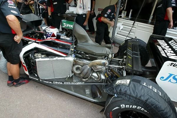 Formula One World Championship: A Ford Cosworth engine in the back of the Minardi PS03