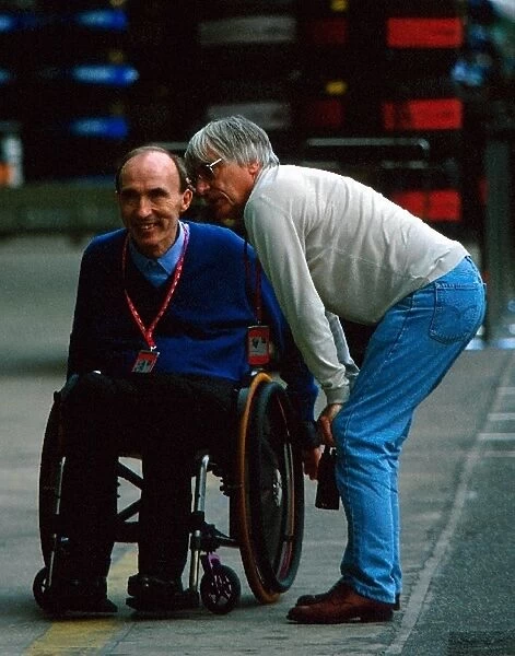 Formula One World Championship: Frank Williams Williams Team Owner talks with Bernie Ecclestone F1 Supremo
