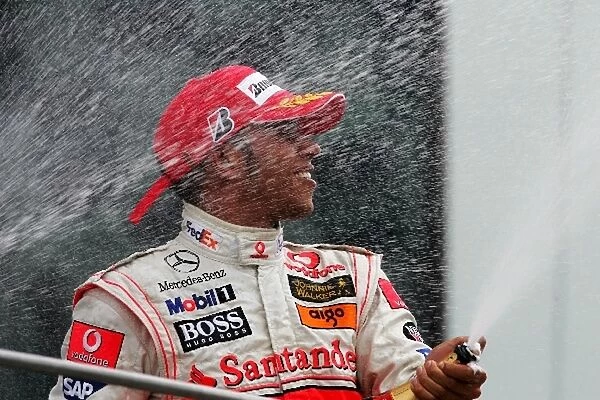 Formula One World Championship: Frw Lewis Hamilton McLaren celebrates on the podium