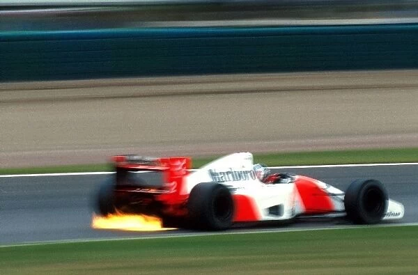 Formula One World Championship: Gerhard Berger McLaren MP4 / 7A suffered an early retirement with an engine failure