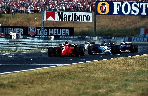 Formula One World Championship: Gerhard Berger Ferrari 412 T2 - 3rd place - leads Johnny Herbert Benetton Renault B195 and Heinz Harald Frentzen