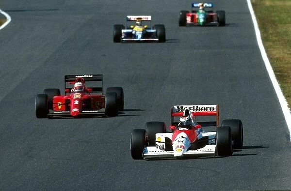 Formula One World Championship: Gerhard Bergers McLaren leads Nigel Mansells Ferrari