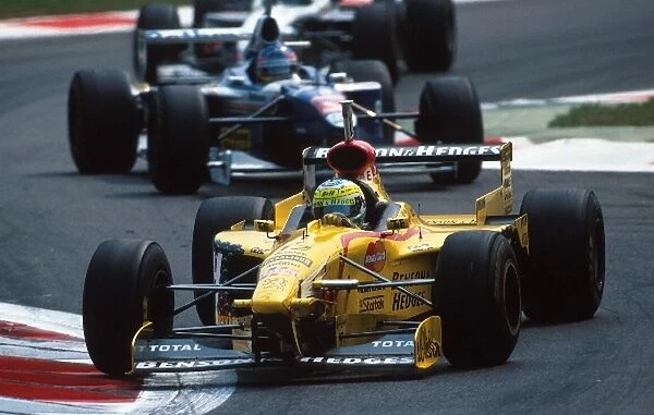 Formula One World Championship: Giancarlo Fisichella Jordan 197 leads Jacques Villeneuve Williams