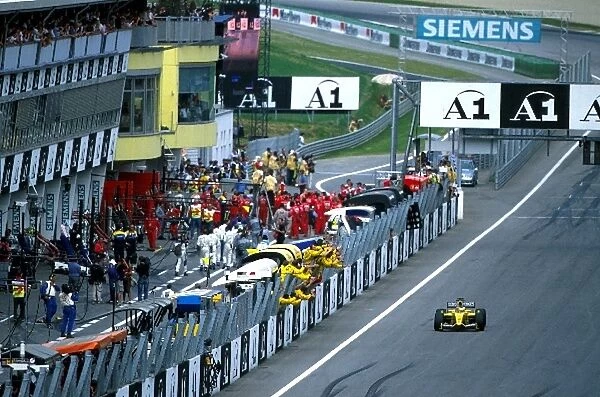Formula One World Championship: Giancarlo Fisichella Jordan Honda EJ12 crosses the line in 5th place to give the team its first points of the season