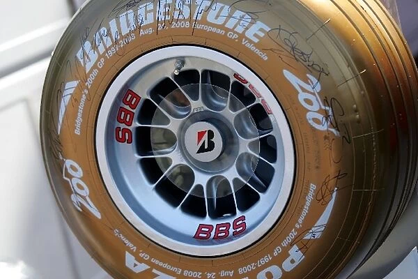 Formula One World Championship: A Golden Bridgestone tyre signed by the F1 drivers