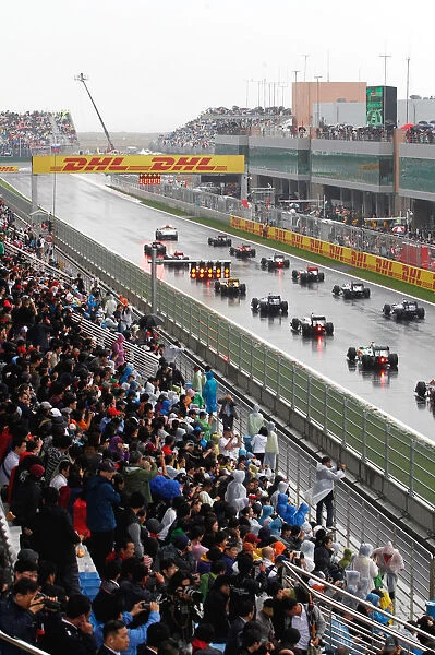 Formula One World Championship: The grid lines up behind the Safety Car for the start of the race