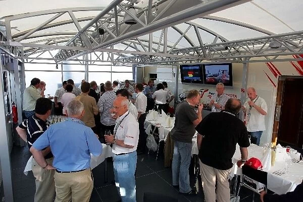 Formula One World Championship: Guests at the Panasonic Toyota dinner in the Toyota motohome