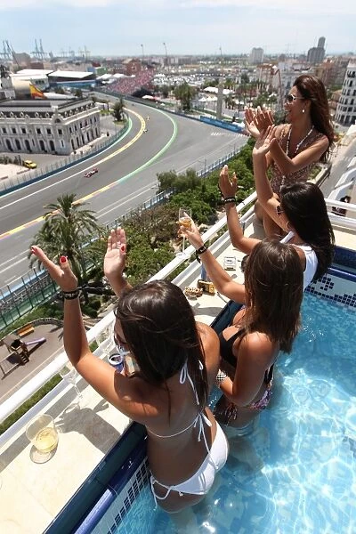Formula One World Championship: Guests watch the action from the Red Bull pool party