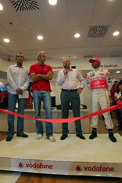 Formula One World Championship: Gyula Czollner Hungarian F1 TV Presenter, Tamas Kasas Two-times World and Olympic waterpolo Champion, a Vodafone man