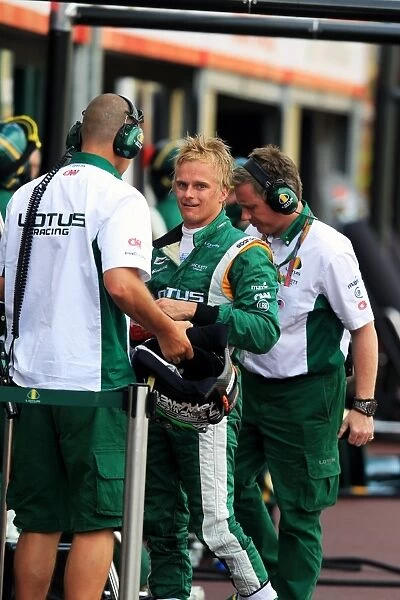 Formula One World Championship: Heikki Kovalainen Lotus T127 retires from the race