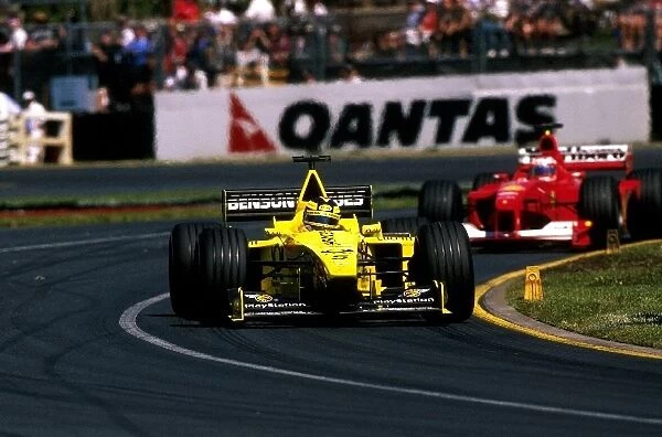 Formula One World Championship: Heinz-Harald Frentzen Jordan Mugen Honda EJ10 leads Rubens Barrichello Ferrari F1 2000