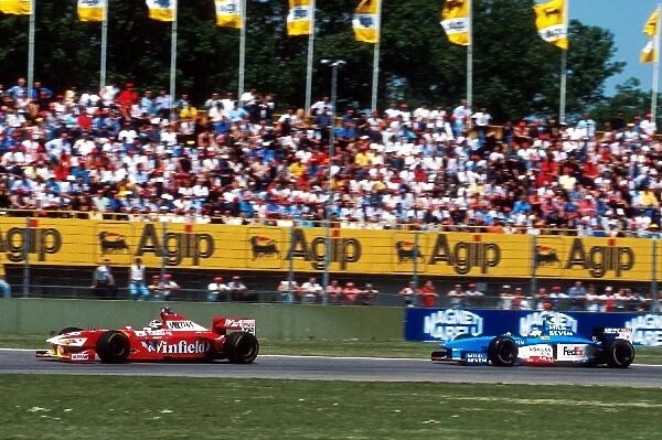 Formula One World Championship: Heinz-Harald Frentzen Williams Mecachrome FW20, who finished in 5th place, leads Giancarlo Fisichella Benetton