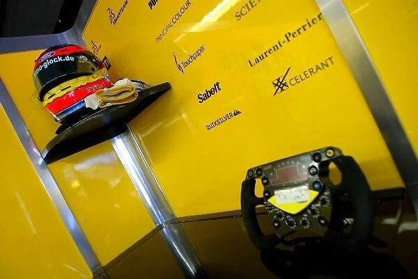 Formula One World Championship: The helmet and steering wheel of Grand Prix debutante Timo Glock Jordan Test Driver