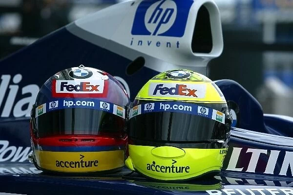 Formula One World Championship: The helmets of Juan Pablo Montoya and his Williams team mate Ralf Schumacher with the new HP liveried Williams FW24