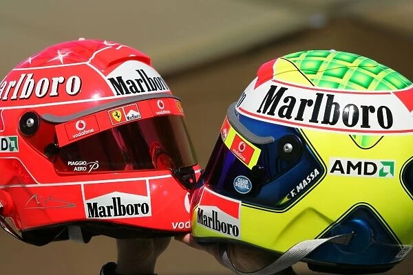 Formula One World Championship: The helmets of Michael Schumacher Ferrari and Felipe Massa Ferrari
