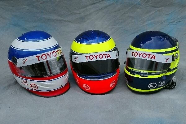 Formula One World Championship: The helmets of Olivier Panis Toyota, Ricardo Zonta Toyota Test Driver and Cristiano Da Matta Toyota