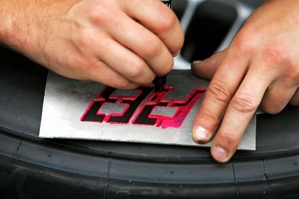 Formula One World Championship: Honda mechanic marks tyres