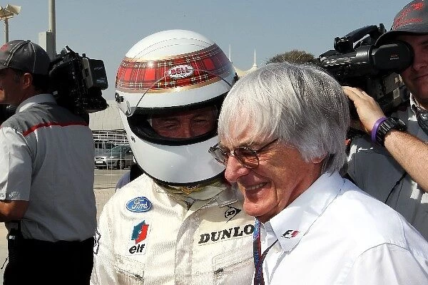 Formula One World Championship: Jackie Stewart with Bernie Ecclestone CEO Formula One Group