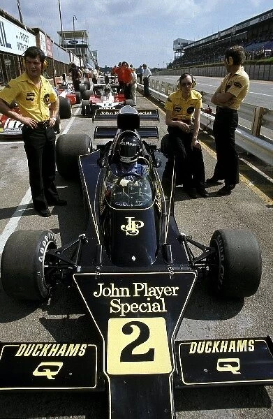 Formula One World Championship: Jacky Ickx debuted the Lotus 76, but retired on lap 32 with brake trouble after colliding with his team mate on the first lap