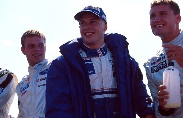 Formula One World Championship: Jacques Villeneuve, Williams FW19, 4th place with fellow drivers David Coulthard, McLaren MP4-12 and Jan Magnussen