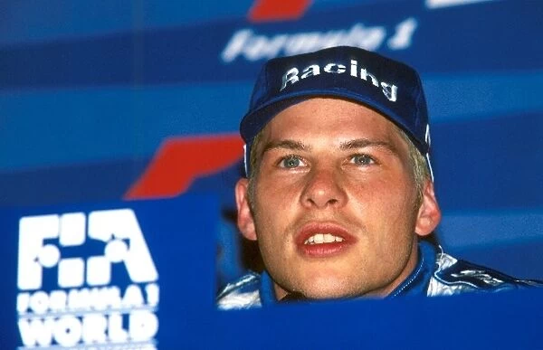 Formula One World Championship: Jacques Villeneuve, Williams FW19, 1st place in the post race press conference