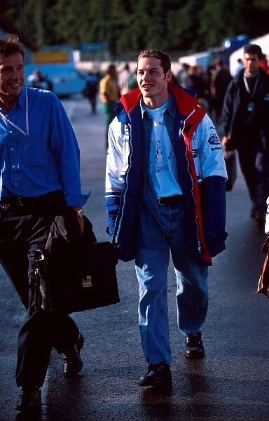 Formula One World Championship: Jacques Villeneuve Williams FW18 with his manager Craig Pollock, left
