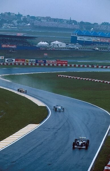 Formula One World Championship: Jacques Villeneuve Williams FW18 leads Alesi and Barrichello