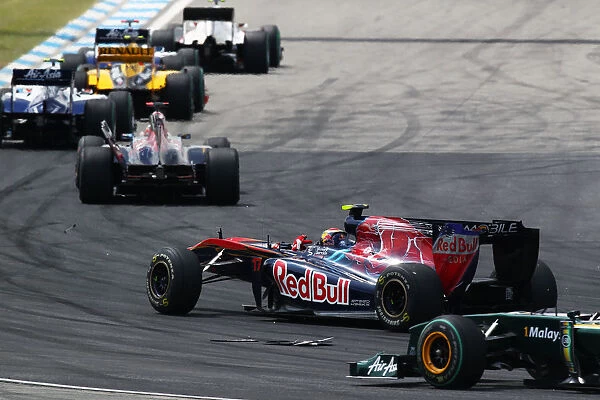 Formula One World Championship: Jaime Alguersuari Scuderia Toro Rosso STR5 crashes with team mate Sebastien Buemi Scuderia Toro Rosso STR5