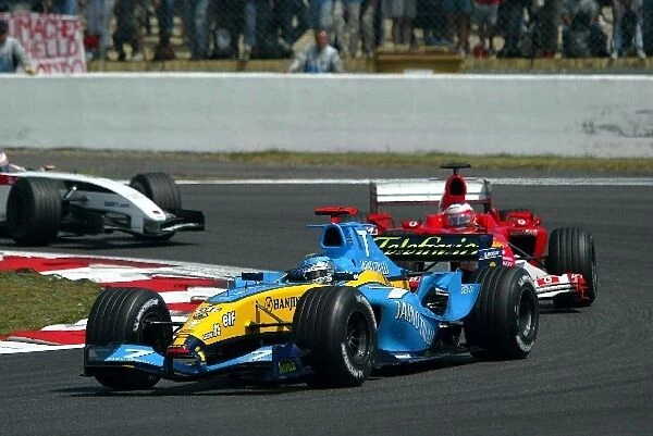 Formula One World Championship: Jarno Trulli leads Rubens Barrichello and Jenson Button