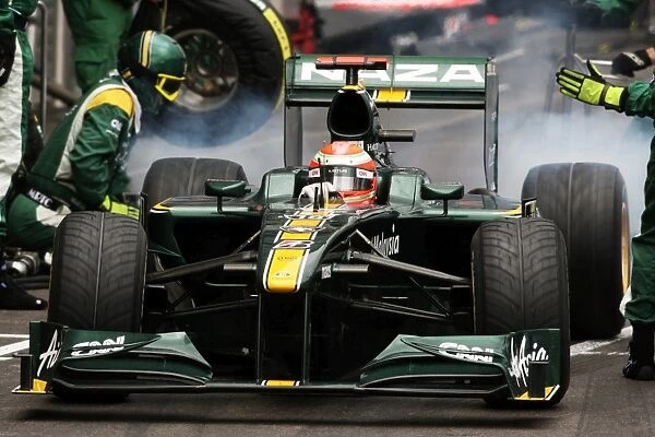 Formula One World Championship: Jarno Trulli Lotus T127 makes a pit stop