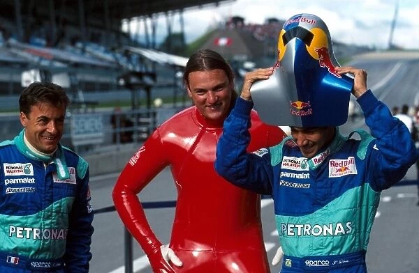 Formula One World Championship: Jean Alesi, left and Pedro Diniz, right meet Red Bull supported skier