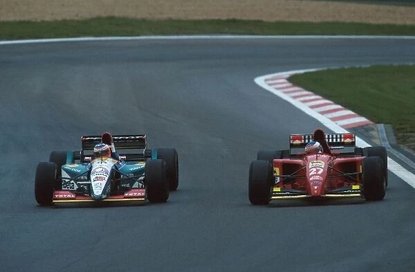 Formula One World Championship: Jean Alesi Ferrari 412T2 and Rubens Barrichello, Jordan 195 battle for position