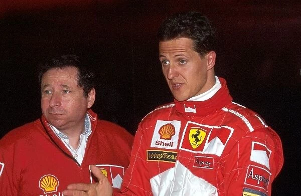 Formula One World Championship: Jean Todt Ferrari and Winner Michael Schumacher Ferrari F300