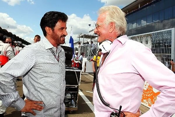 Formula One World Championship: John Button talks with Mohammed Bin Sulayem on the grid