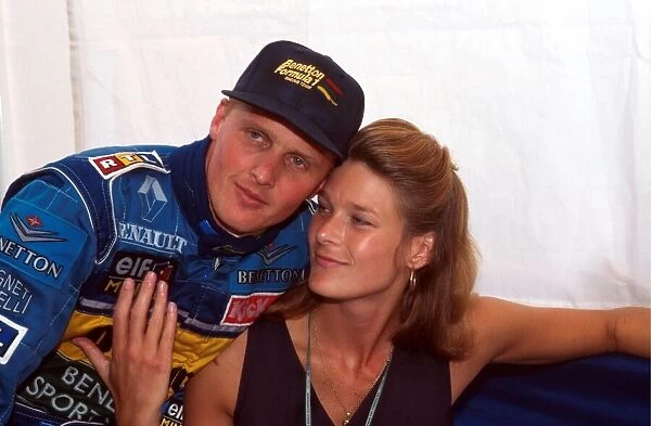 Formula One World Championship: Johnny Herbert celebrates his first GP victory with his wife Becky