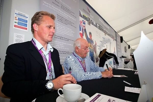 Formula One World Championship: Johnny Herbert and Murray Walker sign autographs for fans
