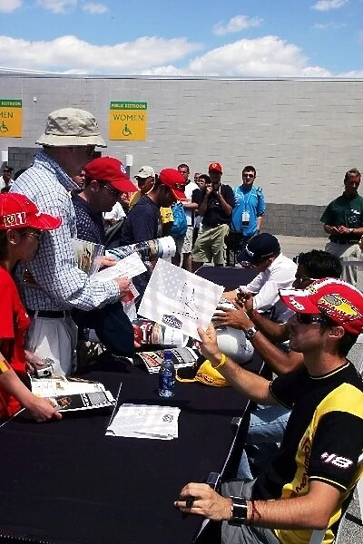 Formula One World Championship: The Jordan drivers sign autographs for the fans