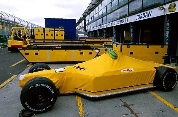Formula One World Championship: A Jordan Ford EJ13 awaits unpacking having been in transit from Europe to Australia for the first race of the season