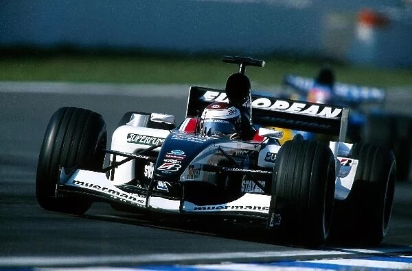 Formula One World Championship: Jos Verstappen Minardi PS03 retired from the race on lap 24 with a hydraulics failure