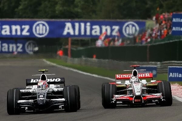 Formula One World Championship: Kazuki Nakajima Williams FW30 and Adrian Sutil Force India F1 VJM01