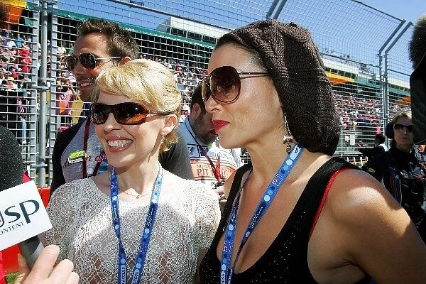 Formula One World Championship: Kylie Minogue with sister Dannii on the grid