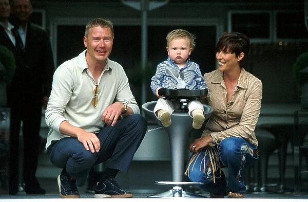 Formula One World Championship: L-R: Mika Hakkinen, his son Hugo Hakkinen, and wife Erja Hakkinen visited the Monaco Grand Prix